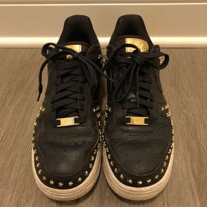 Black w/ gold stars Air Force 1s